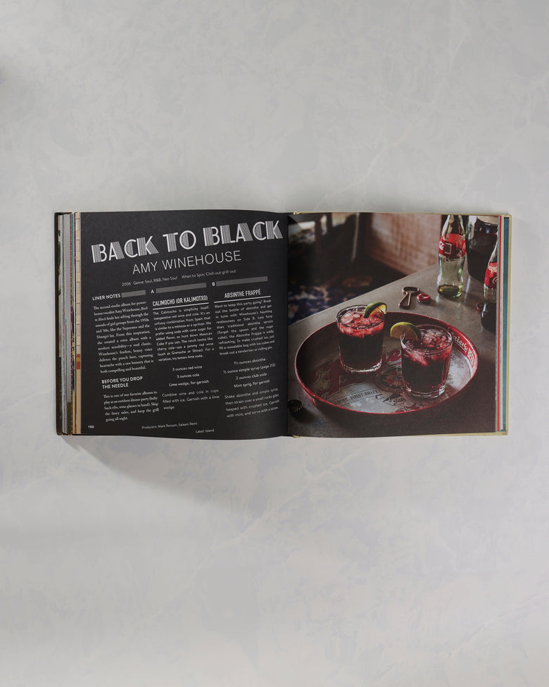 Open Booze & Vinyl book showing an Amy Winehouse entry beside a photograph of two drinks.