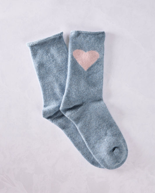 Pair of blue crew socks with a pink heart motif, shown overlapping.