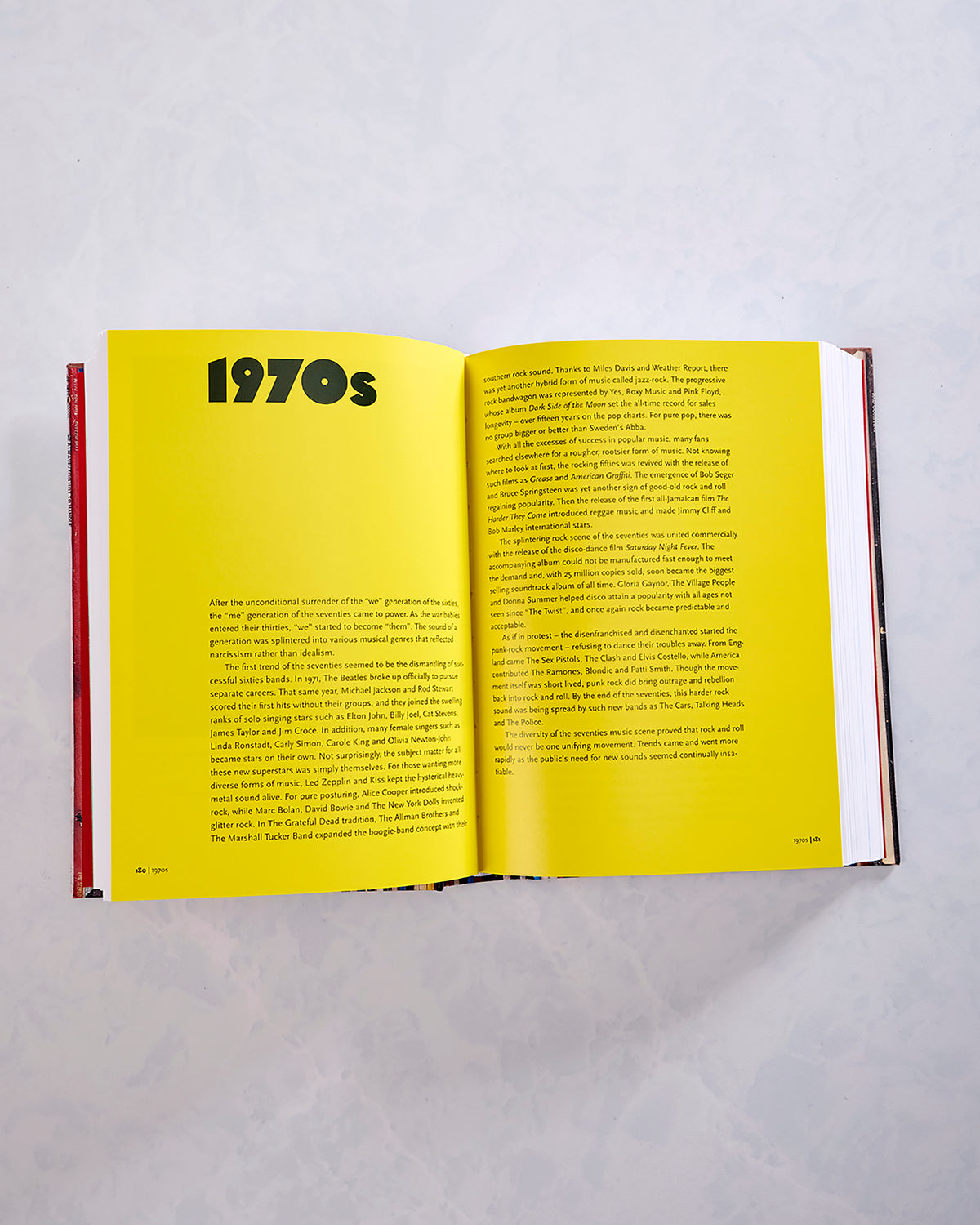 Open book spread with a bright yellow section titled “1970s” and text about 1970s music and culture.