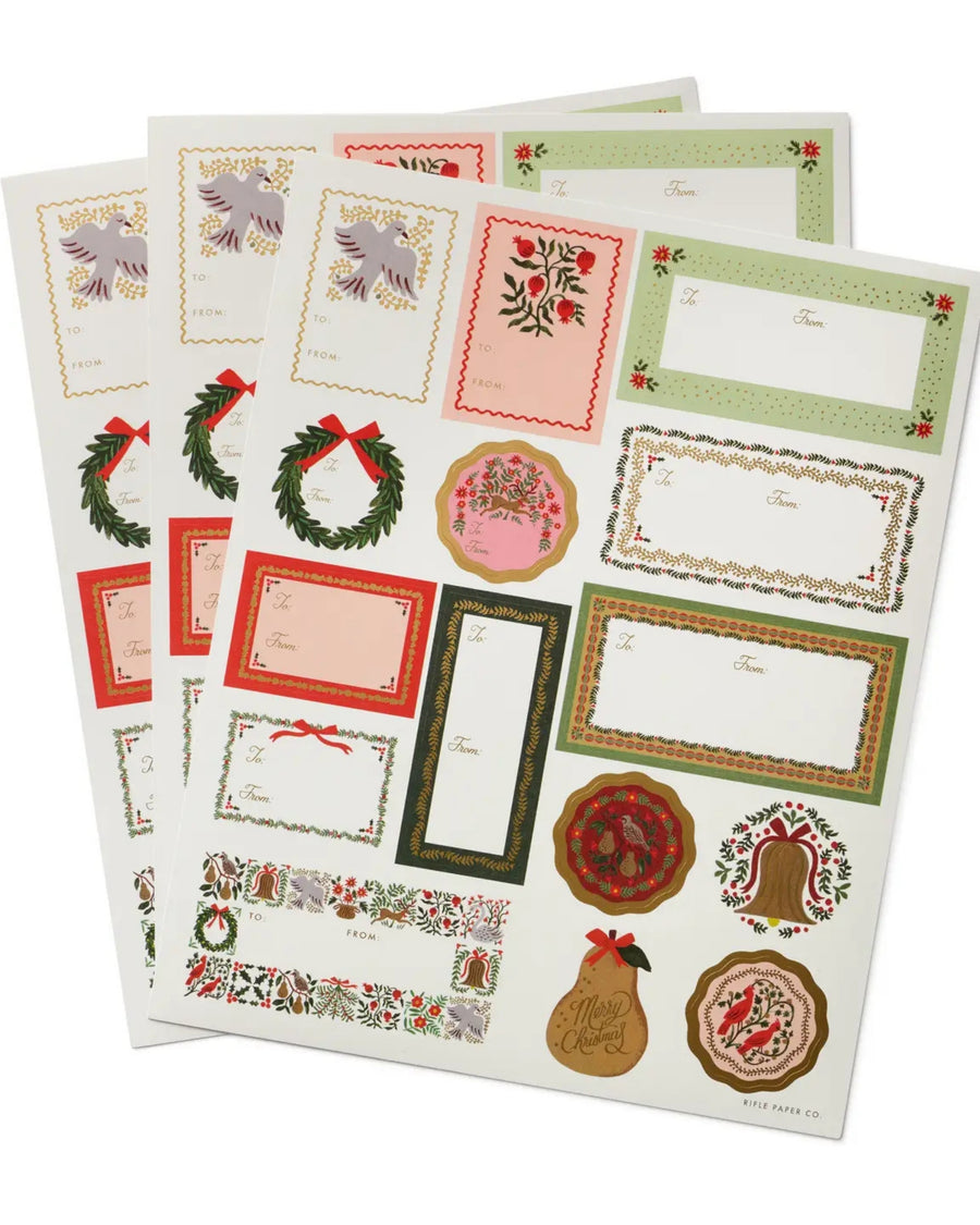 Three sheets of holiday stickers and gift labels with colorful borders, wreaths, birds, bells, and other festive illustrations.