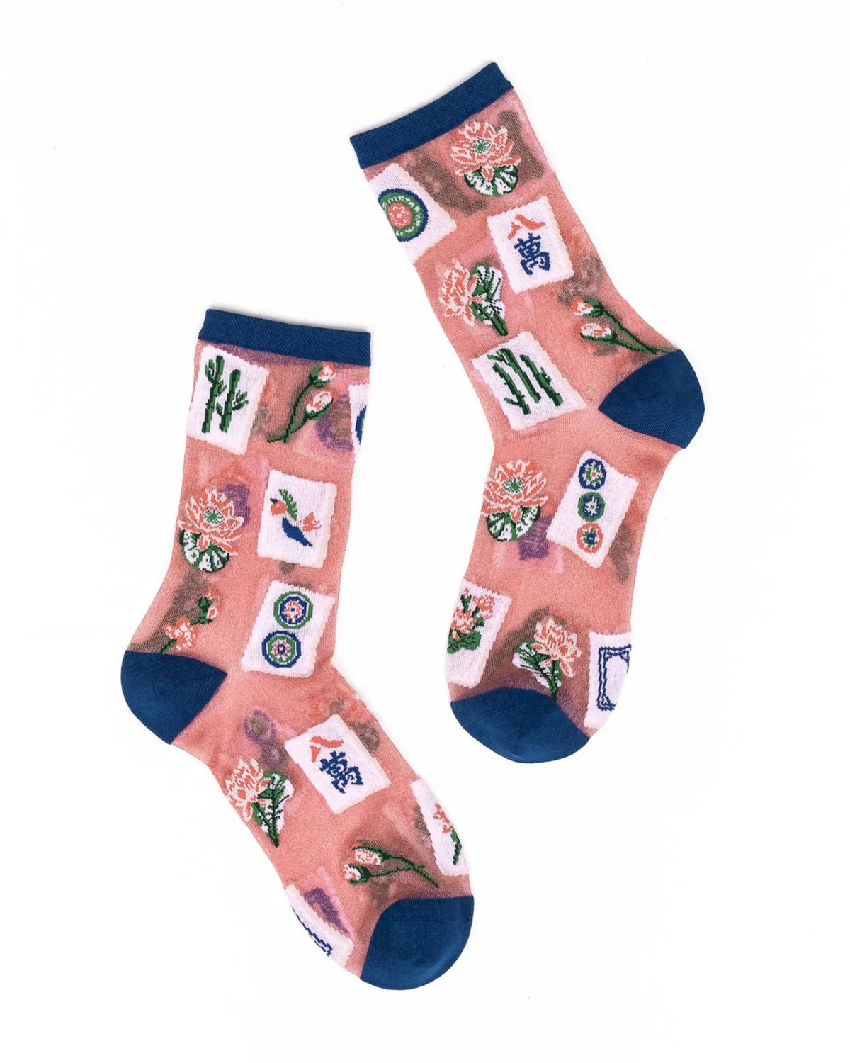 Two pink sheer shimmer crew socks with navy cuffs and heels, decorated with Mahjong-inspired symbols and illustrations.