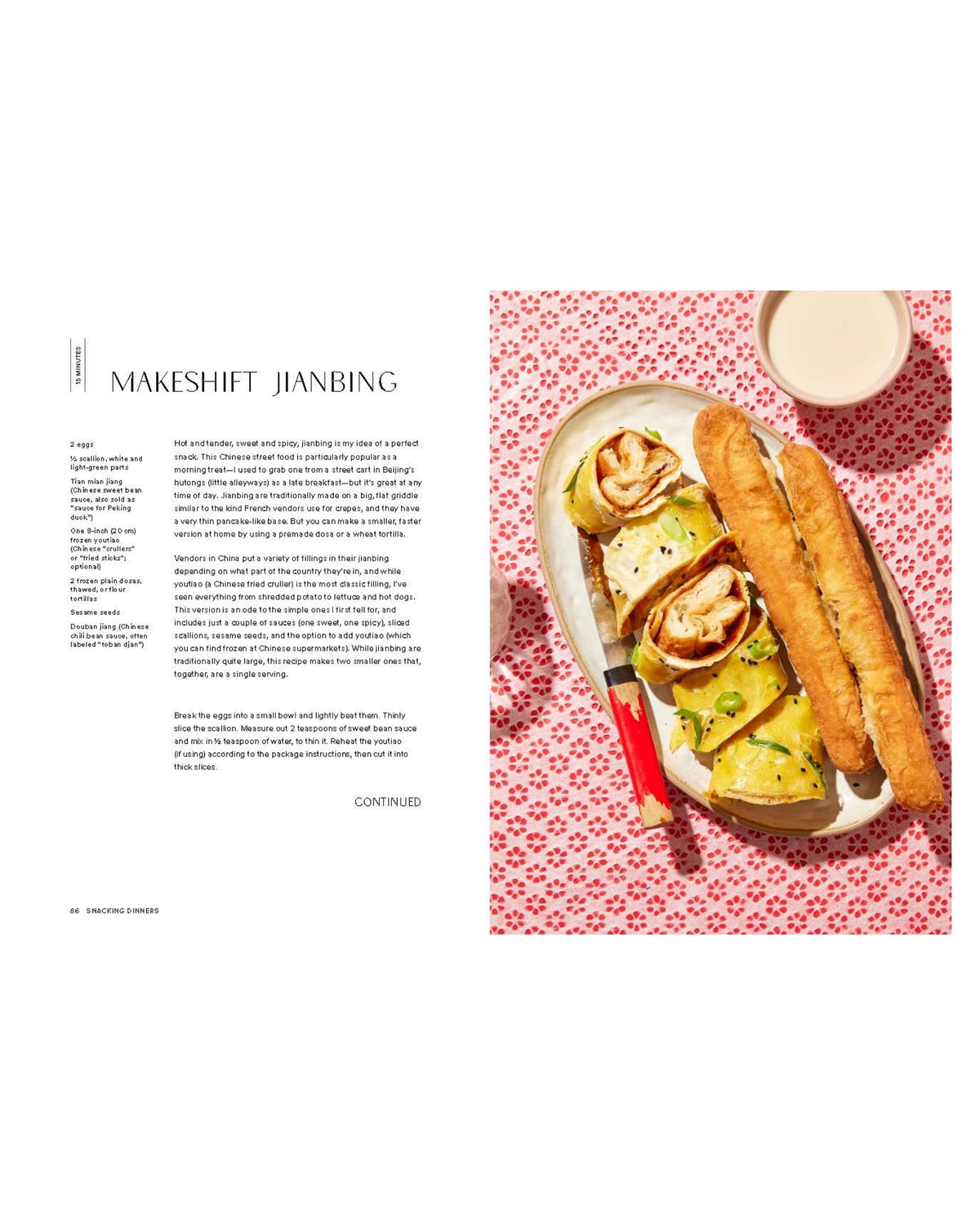 Open Snacking Dinners spread for Makeshift Jianbing, with recipe text beside a photograph of rolled egg-filled flatbread, bread sticks, and a cup.