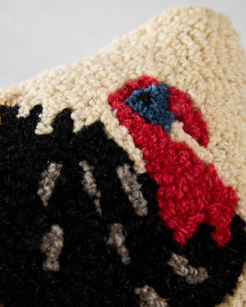 Close-up of the Perky Turkey pillow showing the textured turkey illustration and red-and-blue accent.