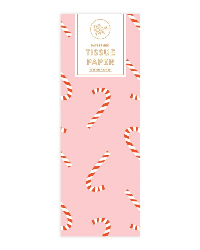 Pink candy cane patterned tissue paper package labeled “PATTERNED TISSUE PAPER,” containing 10 sheets sized 20 by 28 inches.