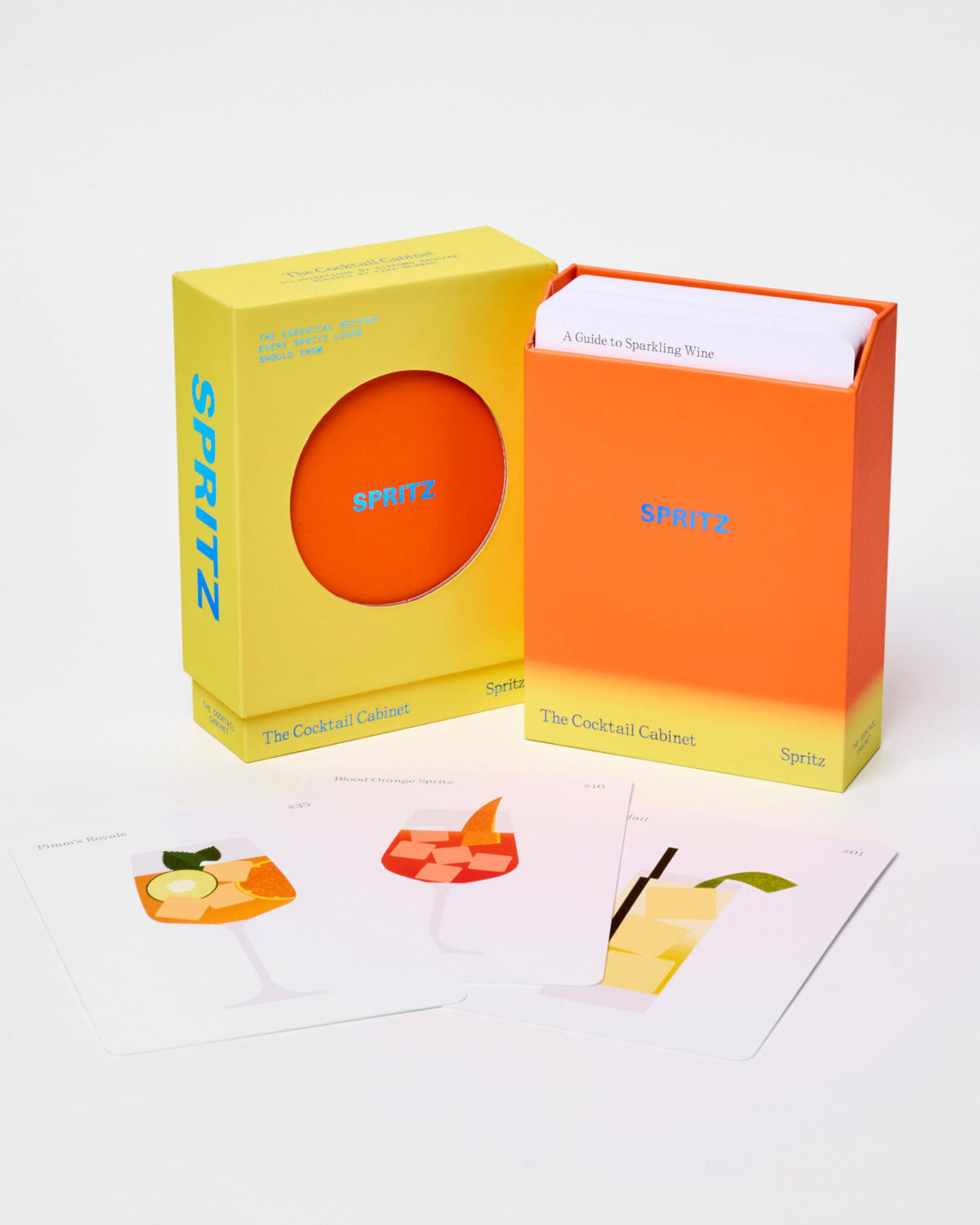 Spritz Cocktail Cabinet packaging displayed open with recipe cards spread in front.