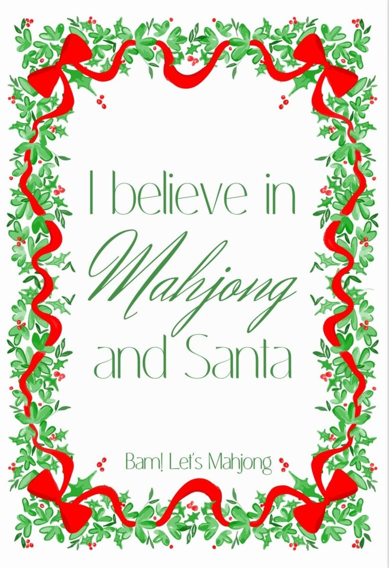 Holiday-themed mahjong design with a holly and red ribbon border and the message “I believe in Mahjong and Santa.”