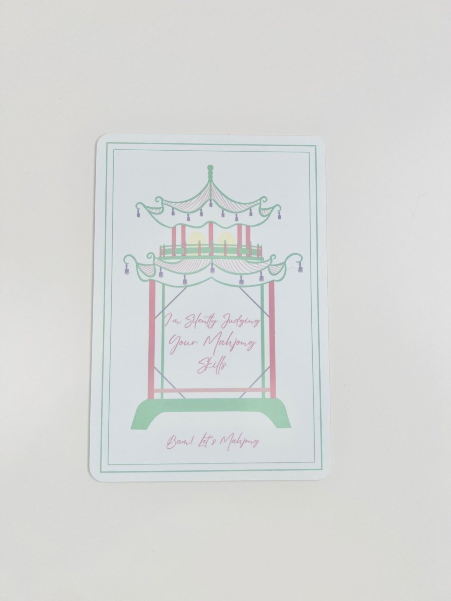 Pastel Mahjong tile shuffler with a carousel illustration and the phrase “I'm Silently Judging Your Mahjong Skills.”