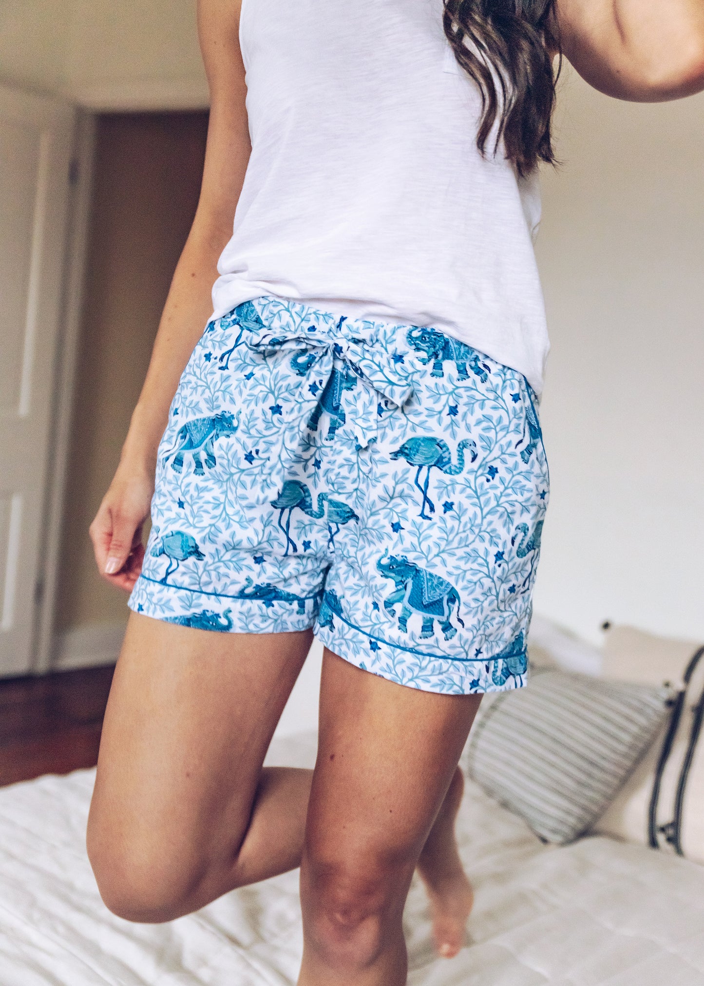 Claudia is 5'8" and wears size S in Flamenco - Pajama Shorts - Pale Blue